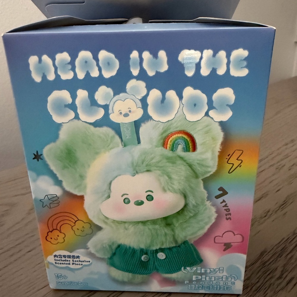 Disney Green Stuffed Animal with Rainbow Accents